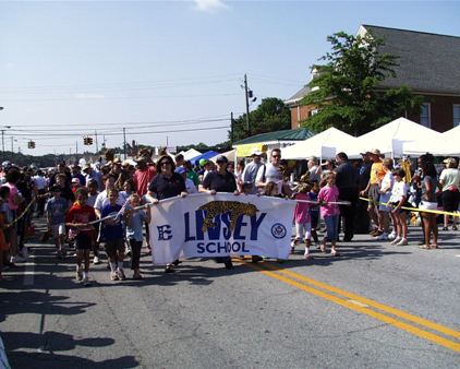 Livsey Elementary School banner and people
